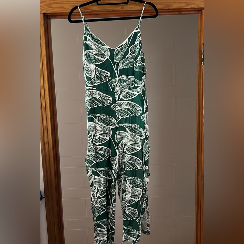Green jumper with graphics
